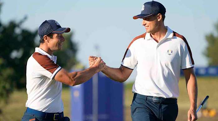 Europe's Ludvig Aberg, right, and partner Viktor Hovland celebrate during their morning foursomes match at the 2023 Ryder Cup.